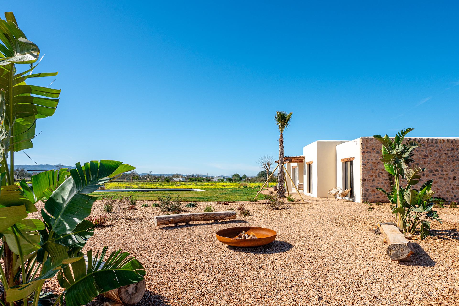 Resa Estates Ibiza te koop for sale finca modern exterior grass.jpg